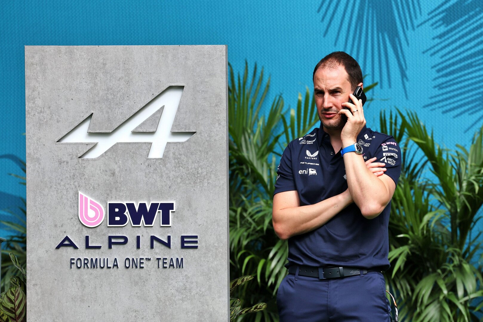 Oliver Oakes, Alpine F1 Team principal, on a phone call.