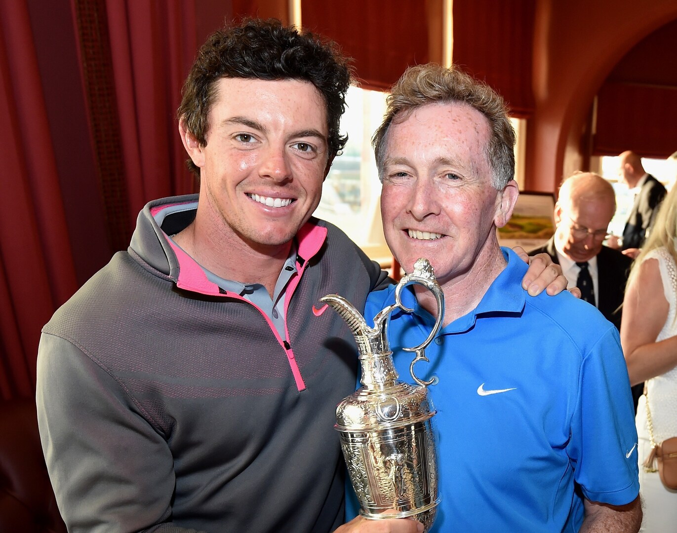 Rory McIlroy and Michael Bannon celebrating McIlroy's Open Championship win.