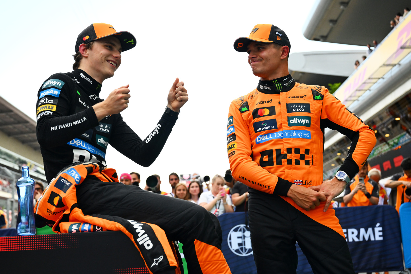 Oscar Piastri and Lando Norris, McLaren F1 drivers, in parc ferme after qualifying.